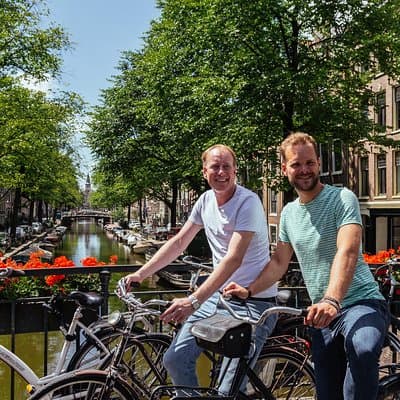 Amsterdam PRIVATE Bike Tour With Locals: Bike & Local Snack Included