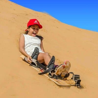 Private Morning Red Dune Safari with Camel Ride & Sandboarding 5