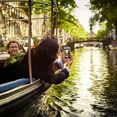 Amsterdam 2-hour Private Canal Cruise with Live Guide and Drinks