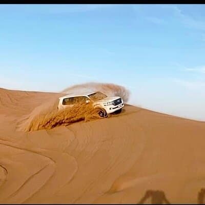 Desert Safari With BBQ Dinner, Camel Ride, Sand Boarding In Dubai