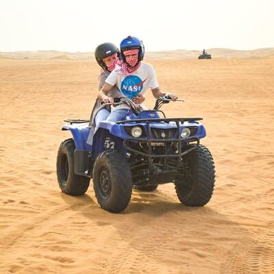 Evening Desert Safari with Quad Bike, BBQ Dinner and Camel Ride