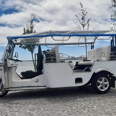 1-hour private eco tuk-tuk tour for up to 6 people through Lisbon