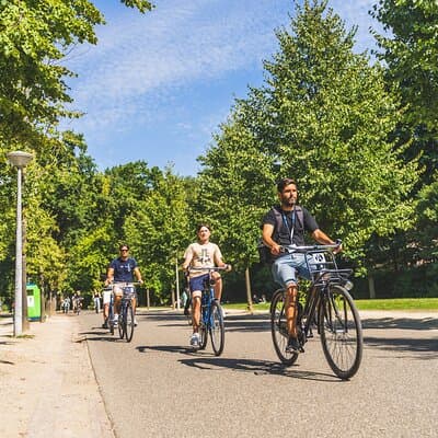 Amsterdam Small-Group Bike Tour With Canal Cruise, Drinks, Cheese