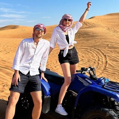 Dubai: Morning Quad bike & Safari Adventure , Sandboarding, camel 5