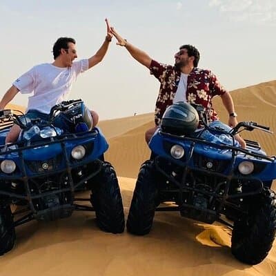 Morning Desert Safari with Quad Bike & Camel Ride & Sandboarding