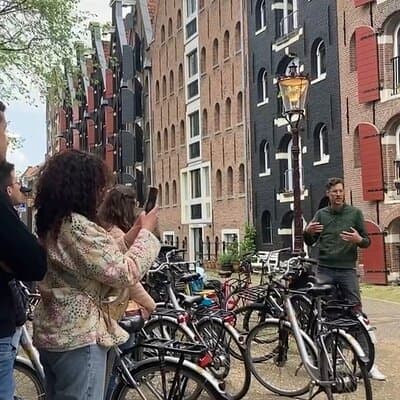 Explore Amsterdam by Bike in the Company of a French Local Guide