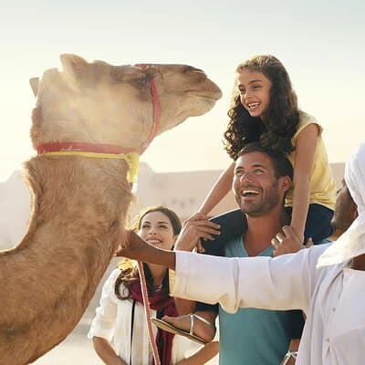 Red Dune Desert Safari with BBQ Dinner, Camel Ride & Live Shows 3