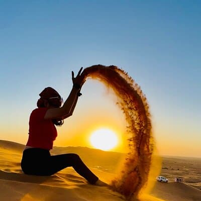 Camel Ride with Sand Boarding at Red Dunes