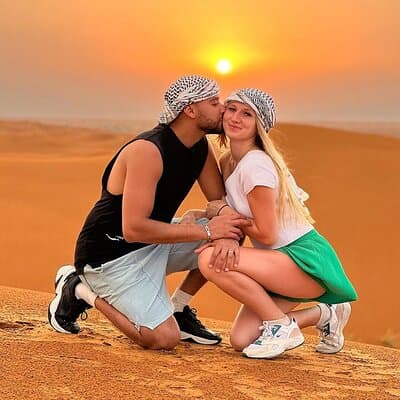 Private Red Dune Safari with BBQ, Camel Ride & Traditional Shows 3