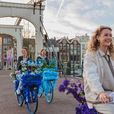 Explore Amsterdam canals on iconic Flower Bikes 2