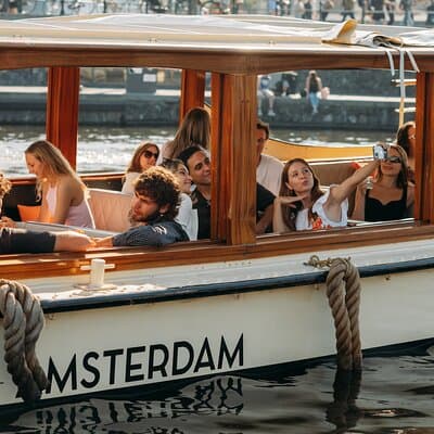 Amsterdam: Saloon Boat Cruise + Unlimited Drinks & Bite option 3