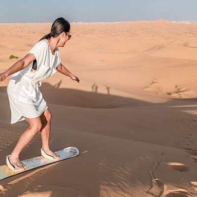 Dubai VIP Desert Safari with Pick/Drop, Camel Ride, Dinner & Show 3
