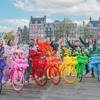 Explore Amsterdam canals on iconic Flower Bikes