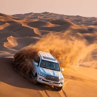 Exclusive Desert Safari Dubai with Camel Ride & Sandboarding