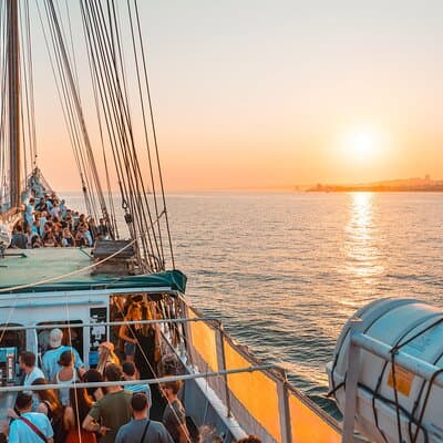 Lisbon Boat Party with Music, Drinks, and Stunning Views.