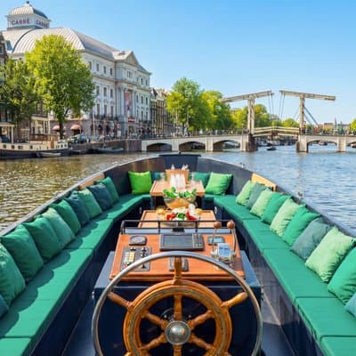 Amsterdam: Guided Open Boat Canal Cruise Unlimited Drinks Option